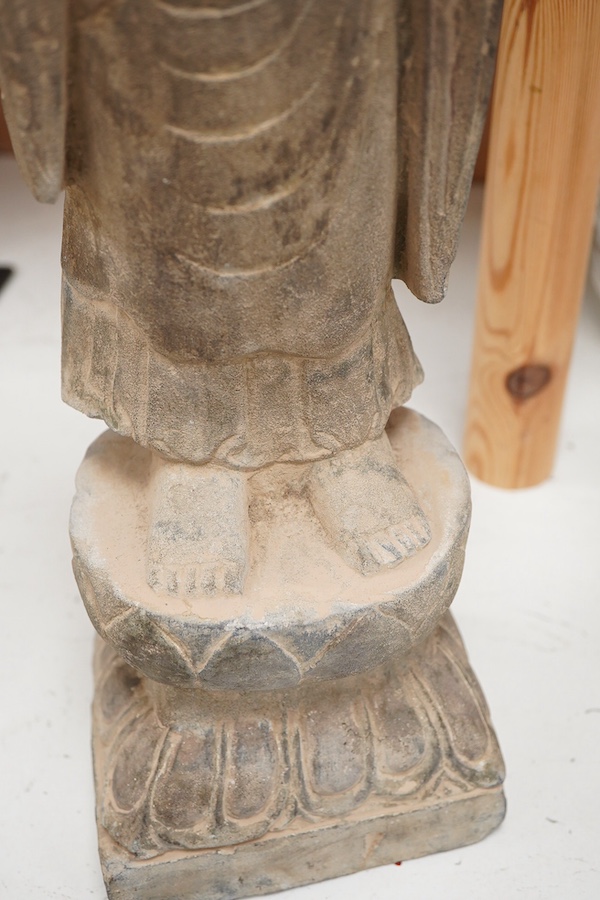 A Chinese composition stone standing figure of Buddha, 48cm high